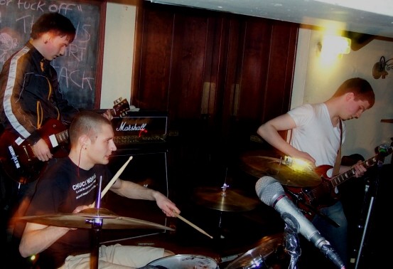Band performing in a small venue