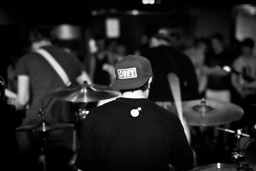 Drummer playing live on stage
