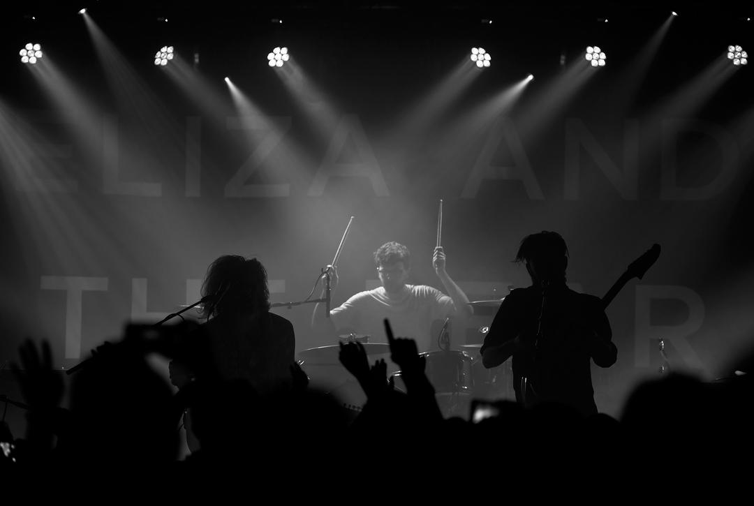 Musicians performing at a live venue